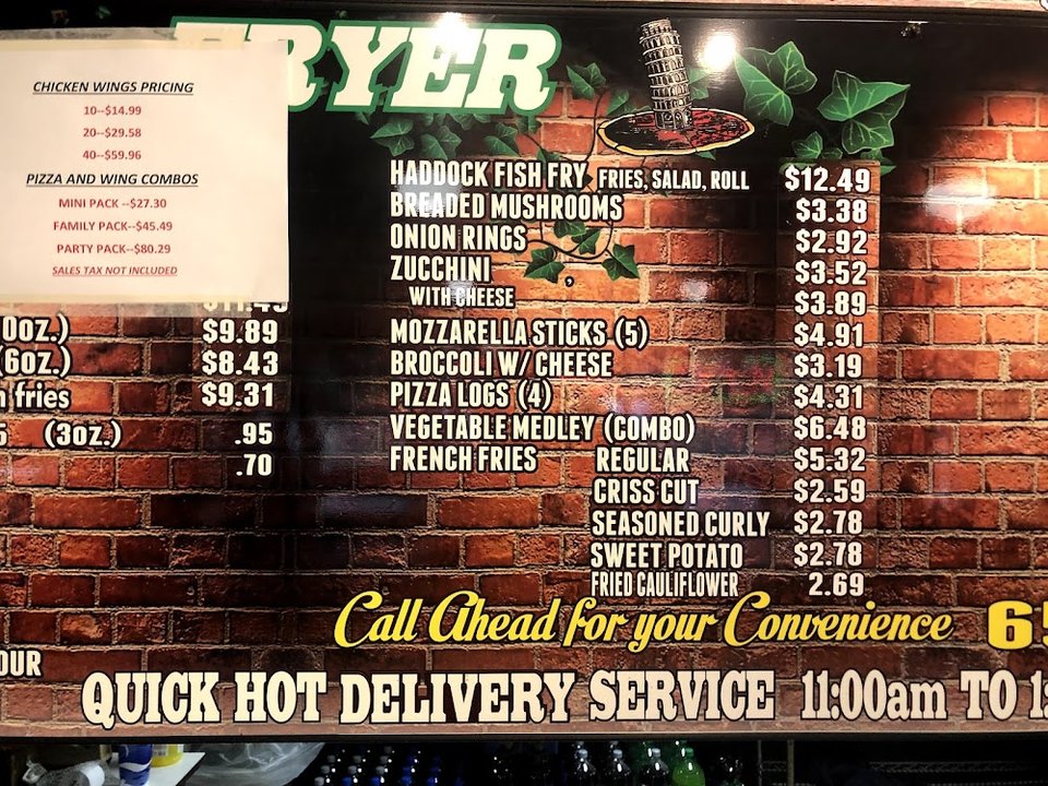 Printed menu with pizza and subs